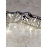 CHLOE & ISABEL Silver-Tone Wavy Bar Hinged Bangle - B094