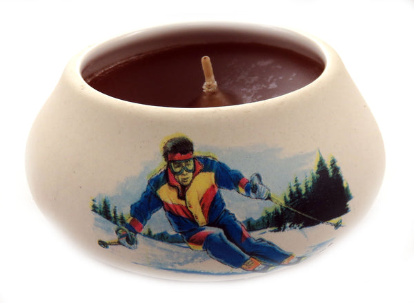 Off white ornamental ceramic candle with a painted design of a skier CNDL17